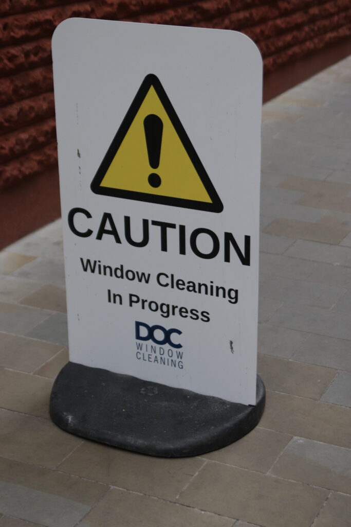 DOC Cleaning WIndow Cleaning In Progress Caution Sign