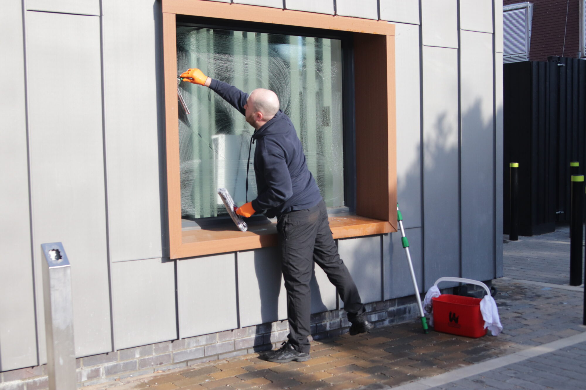 Squeegee window cleaning